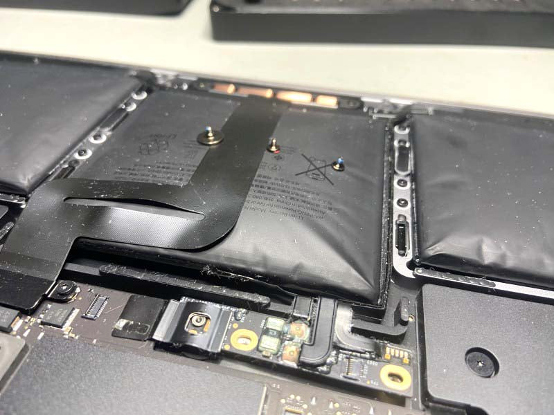 Svullet batteri på Apple Macbook Pro